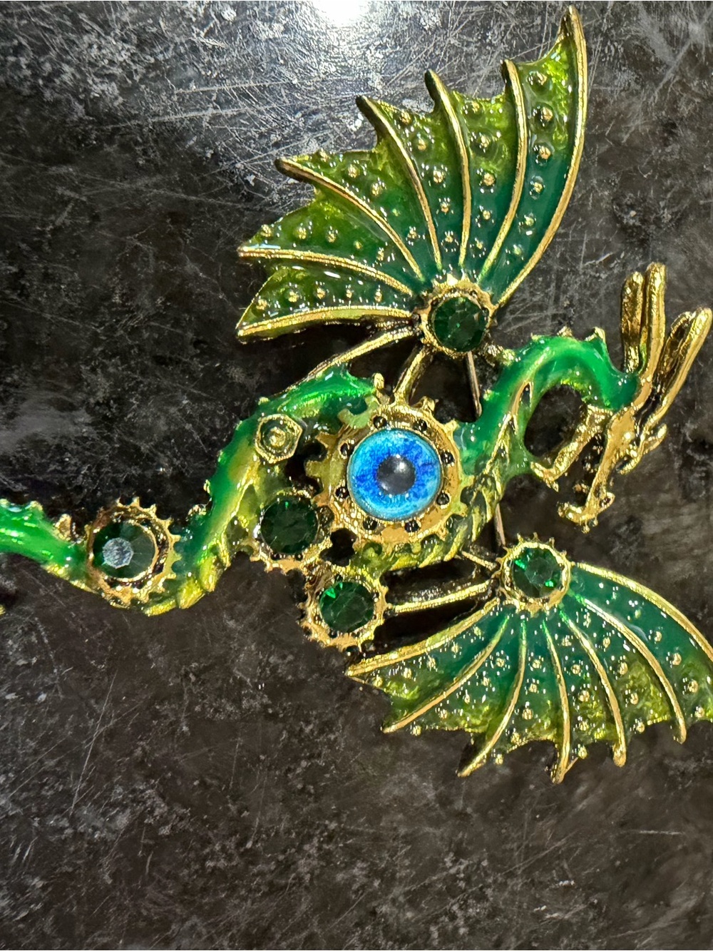 Green Enamel Dragon Brooch with Blue Center Stone